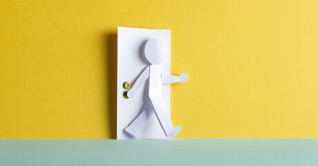 Poster - Paper figure exits door. Yellow background, light blue surface. Simple design, conceptual image, flat layers. Minimalist style.