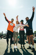 © Jacob Lund - Friends celebrating together after a successful community run