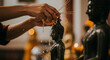 © adebaguspr - Hands Pouring Water Over a Buddha Statue Symbolic Ritual Closeup View