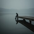 © popuo design - Solitary Figure Contemplating on a Misty Lake Pier: A Moment of Introspection and Solitude by the Water