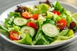 © Dimass - Cucumber tomato salad with greens