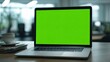 © Muhammadhamza - Modern Laptop Display with Green Screen Background for Professional Presentations