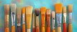 © Sarinya - Assortment of artist paint brushes on colorful background studio shot close up art supplies for painting