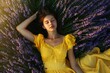 © Rayhanbp - Woman relaxing in a field of fragrant purple lavender enjoying the peaceful moment