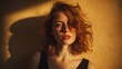 © Yopi - Young Woman Standing Outdoors in Golden Sunlight with Soft Wind and Dynamic Hair Movement