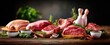 © Studio Nova - The colorful assortment of fresh meats and herbs on a rustic wooden table.