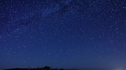 Wall Mural - night sky full of stars creates a peaceful space concept. abstract dark starlit background for relax