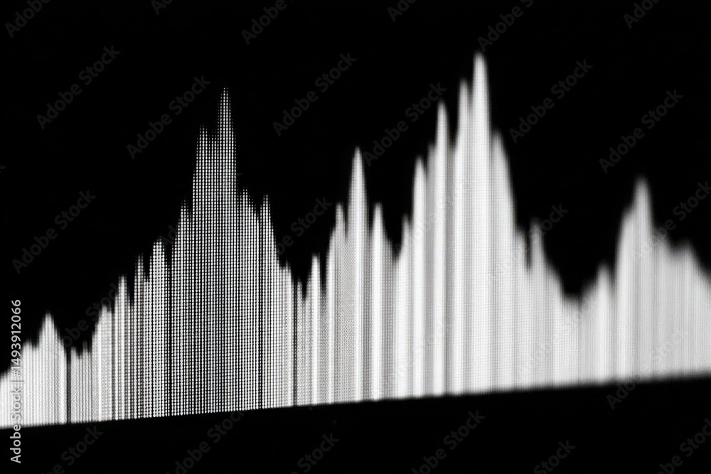 A series of vertical bars rise and fall to represent sound frequencies on a dark background.