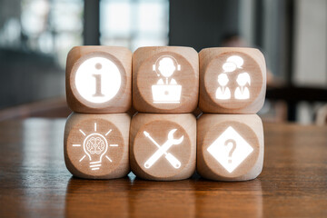 Wall Mural - wooden blocks with icons representing help desk concepts like information, support, teamwork, innova