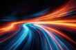 © Monika - Abstract streaks of blue and orange light trails curving with dynamic motion on a dark background creating a sense of high energy and speed