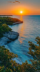 Wall Mural - sunset over tranquil ocean, rocky coastline, vibrant colors