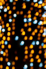 Wall Mural - a blurry image of a light show with orange and blue lights