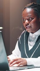 Aufkleber - Business, night and black woman in office, laptop or typing with research for news report. African person, evening or journalist in workplace, pc or writing with review, smile or feedback for article