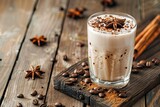 Cold creamy horchata coffee, with coffee beans and spices, wooden background copy space