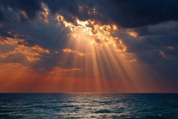 Aufkleber - Dramatic sunset rays penetrating clouds over a calm ocean surface in a tranquil evening sky