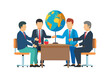 © Sarfraz - Business Agreement Concept. Vector illustration in flat style of a group of diverse people sitting at a desk and two businessmen at the head shaking hands with a world