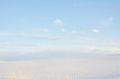 © Connect Images - Vast desert landscape with rippled sand dunes under a clear blue sky. Road Trip USA