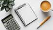 © Songsak - Accounting and financial planning flat lay with notebook calculator mobile phone coffee and pen on white