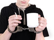 © Sabphoto - Young Man in Handcuffs