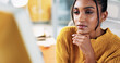 © peopleimages.com - Reading, computer and thinking with business woman in office for creative newsletter, publication or vision. Email marketing, reflection and copywriting editor with person in startup agency for idea