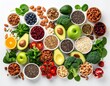 © Masrur - High resolution photo of a healthy mix of fresh fruits, vegetables, nuts and seeds arranged aesthetically on a white background.