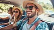 © Mey - A man in a straw hat and sunglasses driving a car with two women in the backseat.