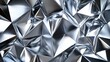 © Jeerawut - Abstract metallic crumpled foil surface with shiny reflective crinkles and folds creating a modern futuristic texture and a sleek industrial appearance