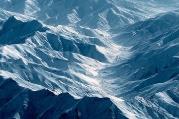 Aufkleber - Beautiful snowy mountain landscapes showcasing gentle valleys and rugged peaks under soft natural light