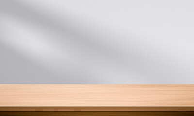 Wall Mural - Wood table top and blurred wall shadow leaves window background can used for display or montage your products