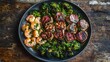 © nur - Plate containing roasted broccoli florets, cooked shrimp, and seasoned slices of beef tenderloin.  The food is arranged attractively and is ready to be eaten.