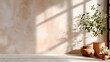 © Thai - A smooth plaster wall in soft beige with light flaring in from the left, emphasizing delicate shadow gradients across the surface 66997226 1
