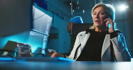 Aufkleber - Night, woman and phone call at computer for cyber crime, negotiation or contact for scam. Mature hacker, team and underground with tech for data phishing, ransomware development or corruption in dark