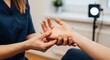 © Aurora Aesthetics - Therapist hands stretching client fingers hand, Manual therapy for joint flexibility, Hand manipulation close-up, Rehabilitation technique