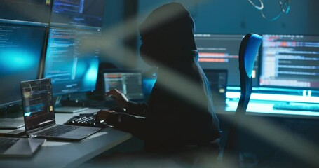Computer, hacking and person with coding at night in control center for password phishing. Ransomware, technology and programmer on website server for crime with database cyber attack for encryption.