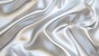 © Farida - A shiny, wavy 3D texture like silver silk or liquid metal. It looks like luxurious fabric or foil with smooth folds and a bright, gradient effect, almost as if it's floating.