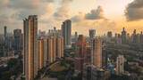 Modern City high-rise skyscraper buildings in Mumbai, a beautiful yellow evening shot. Cloudy sunset in Mumbai City, India