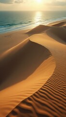 Poster - Serene dunes meeting the ocean at golden hour, creating textured patterns in sand
