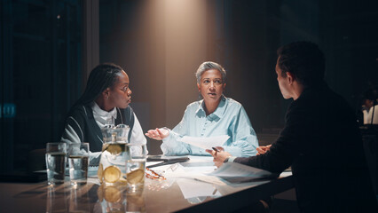 Aufkleber - Paperwork, teamwork and business people at night meeting for overtime, planning or research. Creative startup, collaboration and man and woman working on project, proposal and brainstorming in office