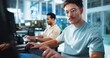 © peopleimages.com - Computer, programmer and glasses with man in office for game designer, coding app and ux update. Software development, research and level gameplay with employees at night for coworking project