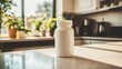 © Ronnayut - A clean white supplement bottle displayed on a polished kitchen counter.