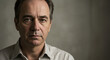 © Konstiantyn Zap - Caucasian mature male in reflective pose against gray background
