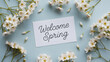 © Mojaher - Welcome spring white flowers blue background