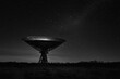 © Iftikhar alam - Giant radio telescope captures the night sky in search of cosmic signals, Giant radio telescope in landscape, oriented skyward, night sky study