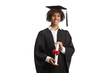 © Ljupco Smokovski - Male african american student wearing a graduation gown and holding a diploma