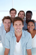 © SolaruS - Smiling diverse team portrait. Happy, successful colleagues together. Represents teamwork, partnership, diversity, and positive workplace environment. Ideal for corporate use.