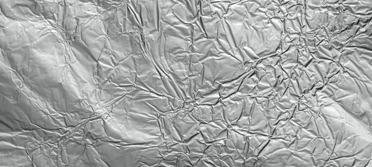 Wall Mural - shiny metal silver gray foil leaf crumpled texture background
