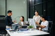 © laddawan - Group of Asian business meeting in planning design in creative business discussing work