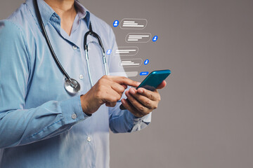 Wall Mural - doctor using smartphone with chat bubbles symbolizing online consultation or medical messaging.