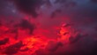 © MDMAHBUBUR - Dramatic crimson sky and dark clouds illuminated by the fiery glow of the sunset