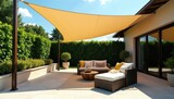 Geometric shade sail casts shadows on stylish patio set, patio, architecture, shadow